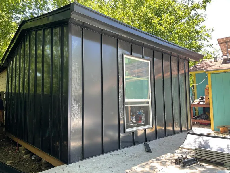 Black standing seam metal wall panels for Roof Inspection in Baldwin