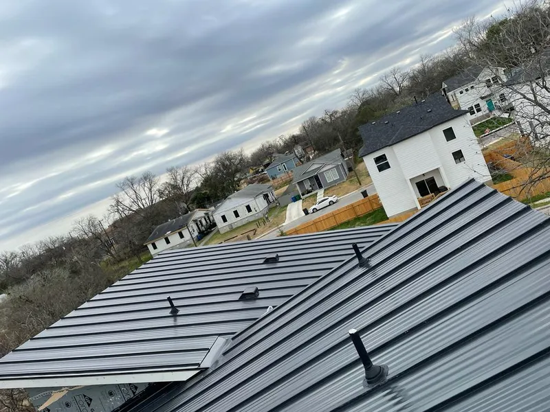 Standing seam metal roof panels with vents for Skylight Repair in Baldwin